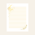 A white lined notepad sheet with a gold crescent moon and stars in the top-left corner and a matching gold sparkle trail in the bottom-right, shown on a light beige background.